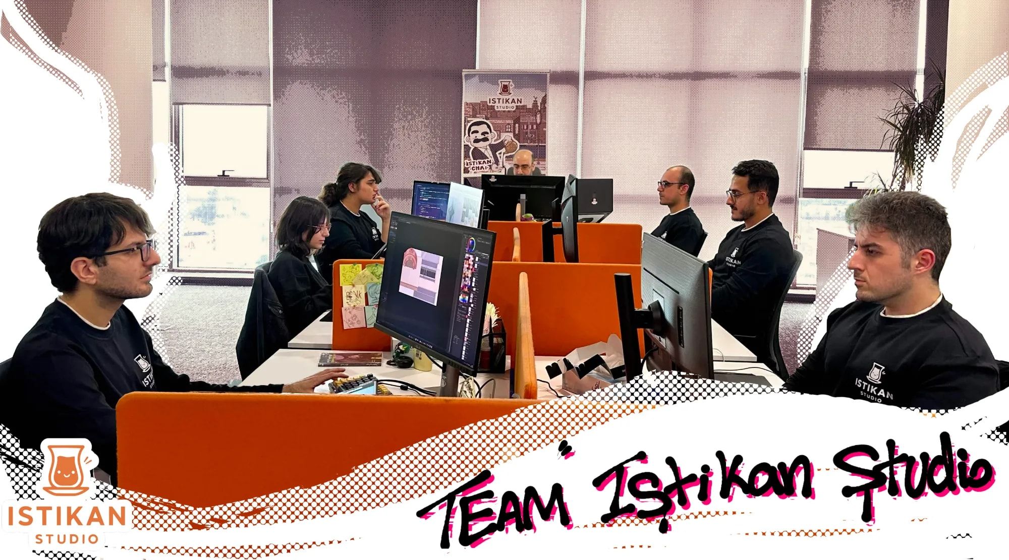 The Istikan Studio team at work at their desks in the Erbil office, with an Istikan Chai poster behind them.